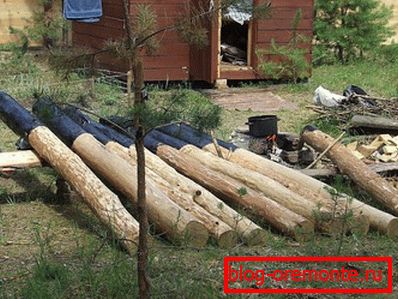 Абмазка слупоў бітумам Абмазка слупоў бітумам